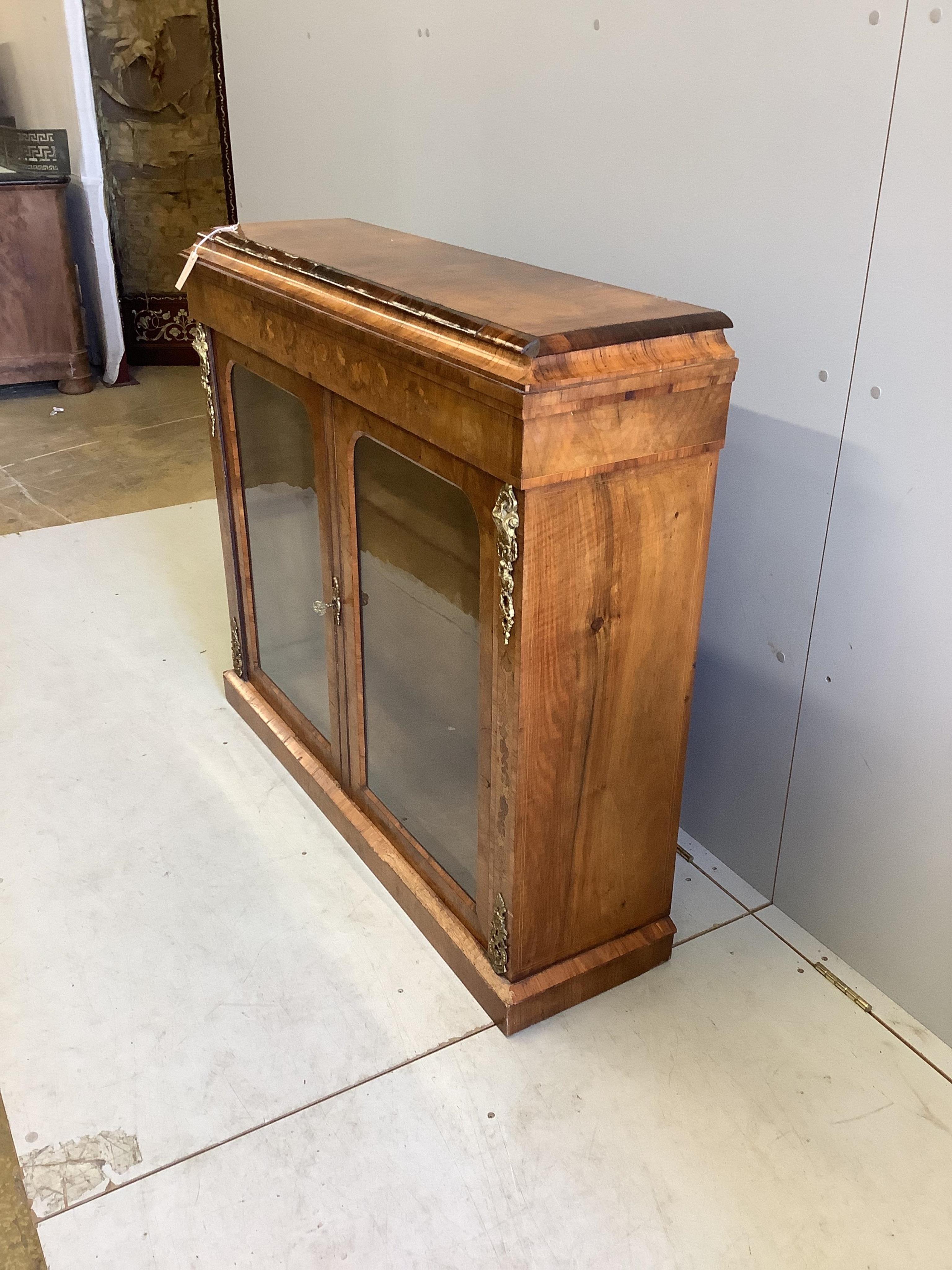 A Victorian gilt metal mounted marquetry inlaid walnut side cabinet, width 117cm, depth 33cm, height 101cm. Condition - fair to good